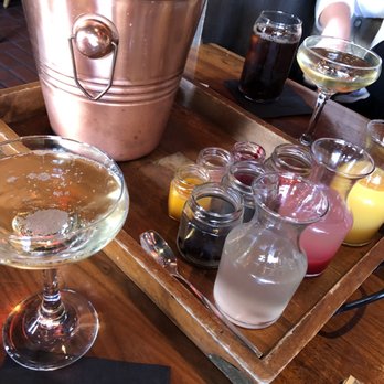 Rustic Root - Mimosa cart! $40! 3 different types of juices, fruits and purées. Fancy! - Cocktail Bars Near Me - San Diego, California Rustic Root - Mimosa cart! $40! 3 different types of juices, fruits and purées. Fancy! - Cocktail Bars Near Me - San Diego, California