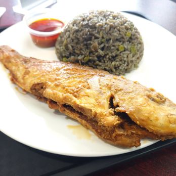 Zoe’s Haitian Restaurant - Stew Fish with Black Rice - Haitian Near Me - Rochester, New York Zoe’s Haitian Restaurant - Stew Fish with Black Rice - Haitian Near Me - Rochester, New York