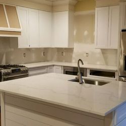 Discover Granite & Marble - Calacatta Dream Quartz Countertop