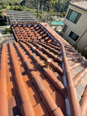Pan and cover concrete tile roof repair - Pan and cover concrete tile roof repair, galvanized and aluminum flashing installation on vent pipes. Newport Coast Pan and cover concrete tile roof repair - Pan and cover concrete tile roof repair, galvanized and aluminum flashing installation on vent pipes. Newport Coast