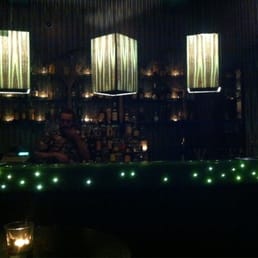 Dim lighting and really beautiful bar. Great for cocktails.