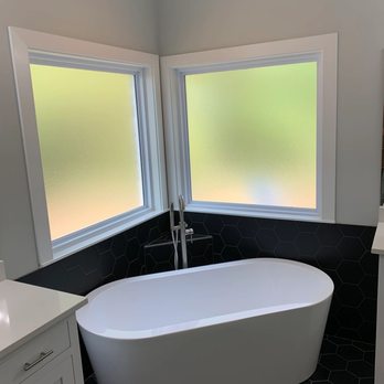 Artisan Remodeling - a bathtub in a bathroom - General Contractors Near Me Artisan Remodeling - a bathtub in a bathroom - General Contractors Near Me