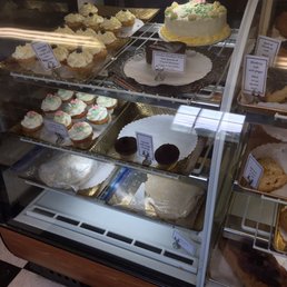 Order cakes over the phone or pick up from the case. Friendly service.