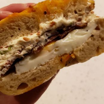 Sidedoor Bagel - Beccy on a hashbrown bagel with bacon scallion cream cheese. - Bagels Near Me - Indianapolis, Indiana Sidedoor Bagel - Beccy on a hashbrown bagel with bacon scallion cream cheese. - Bagels Near Me - Indianapolis, Indiana