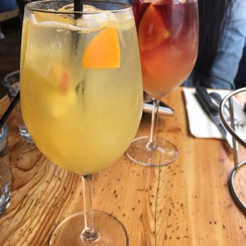 Simmzy's - front: Sunburst Sangria back: Sunrise Sangria - Gastropubs Near Me - Long Beach, California Simmzy's - front: Sunburst Sangria back: Sunrise Sangria - Gastropubs Near Me - Long Beach, California
