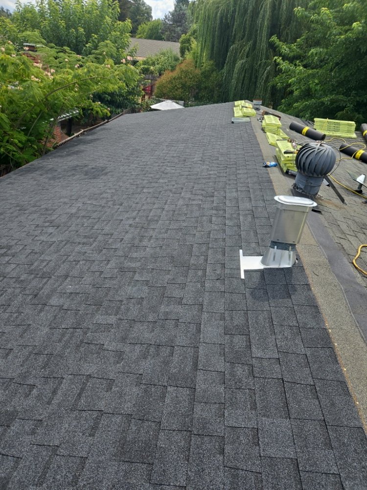 Slide of Thomas Roofing