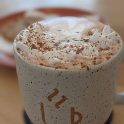 The Tipsy Muse Cafe - Hot chocolate in a hot mug. The hot chocolate was ok.