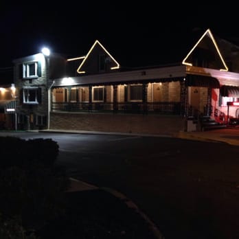 Simmons Motel - This is an evening street view looking into the parking area. - Hotels Near Me - Hershey, Pennsylvania Simmons Motel - This is an evening street view looking into the parking area. - Hotels Near Me - Hershey, Pennsylvania