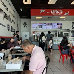Mariachi Bakery - You can see the bakery, menu on the screen, and seating