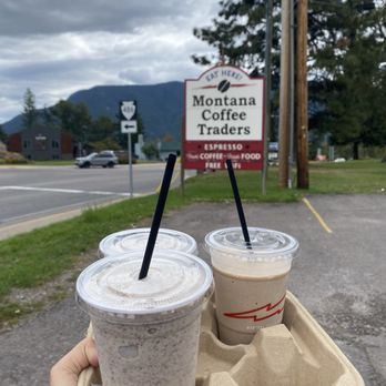 Montana Coffee Traders - Jitterbug 20 oz with a Banana Buzz 16 oz - Coffee & Tea Near Me - Columbia Falls, Montana Montana Coffee Traders - Jitterbug 20 oz with a Banana Buzz 16 oz - Coffee & Tea Near Me - Columbia Falls, Montana