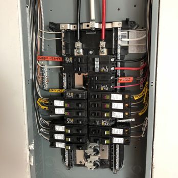 J-CAAB Electric - A residential electrical panel in a residential building. - Electricians Near Me J-CAAB Electric - A residential electrical panel in a residential building. - Electricians Near Me