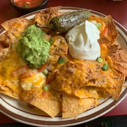 La Herradura - Small Deluxe Bean Nachos. The Jalapeño is from another persons dish at my table.
