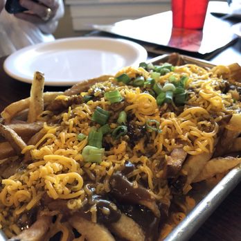 The Camp - Brisket Debris Fries house-cut fries topped with a brown gravy with brisket debris, cheddar cheese and green onions $7 . Very yummy. - Burgers Near Me - Natchez, Mississippi The Camp - Brisket Debris Fries house-cut fries topped with a brown gravy with brisket debris, cheddar cheese and green onions $7 . Very yummy. - Burgers Near Me - Natchez, Mississippi