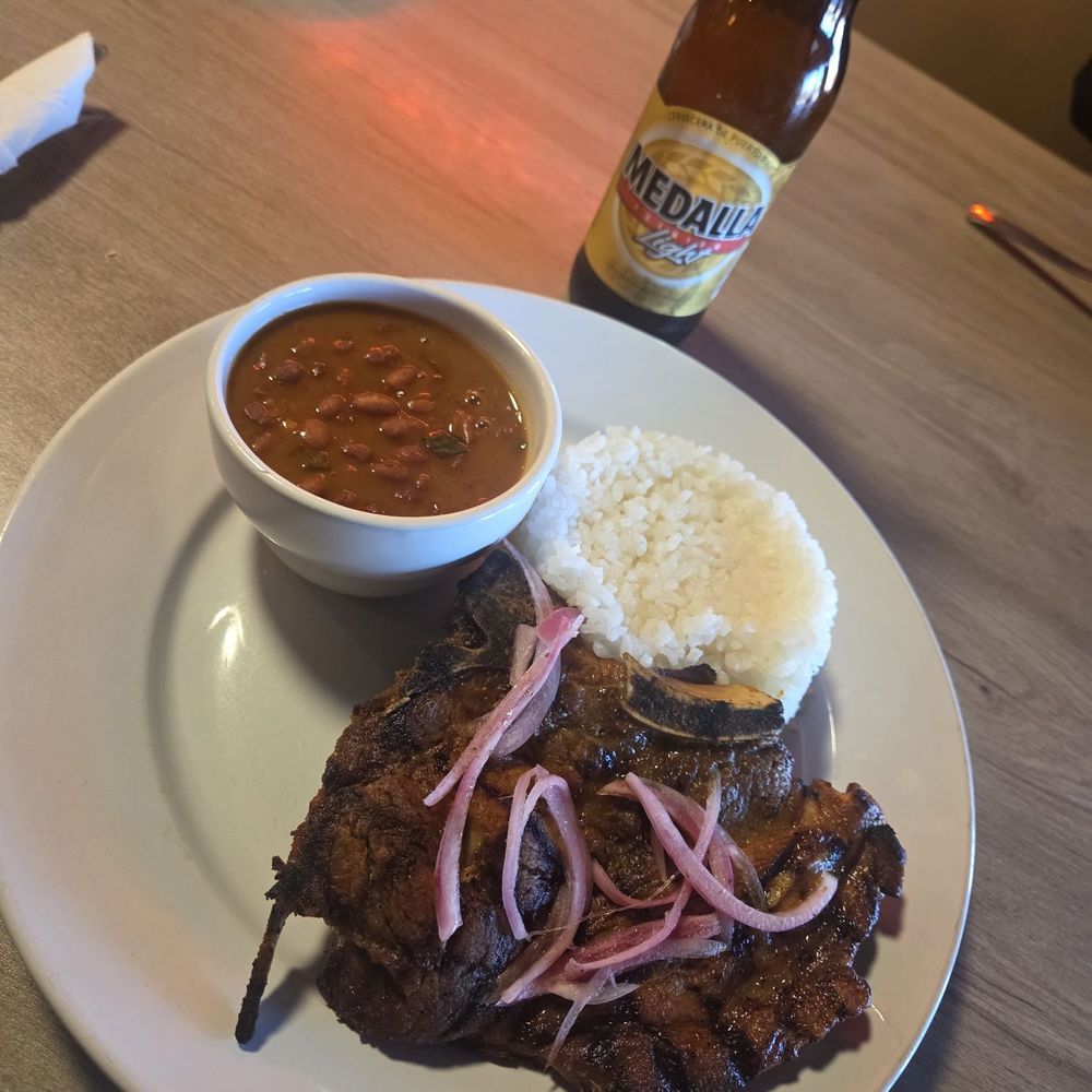 Medella and Pork Chop Lunch Special Medella and Pork Chop Lunch Special