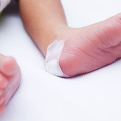 You Choose Labs - Taking a Heel Blood Sample From Newborn Baby