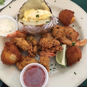 Blue Ocean Seafood - Fried oysters and shrimp with hush puppies and a baked potato - Seafood Near Me - Bay City, Texas Blue Ocean Seafood - Fried oysters and shrimp with hush puppies and a baked potato - Seafood Near Me - Bay City, Texas