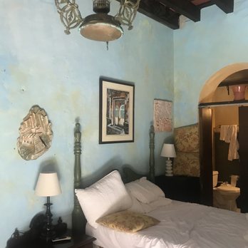 The Gallery Inn - Bed and bathroom in our room - Hotels Near Me - Old San Juan, Puerto Rico The Gallery Inn - Bed and bathroom in our room - Hotels Near Me - Old San Juan, Puerto Rico