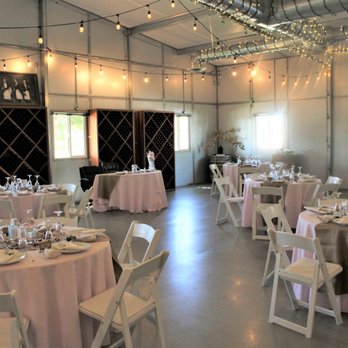 Agua Dulce Winery - Agua Dulce Winery Rustic farmhouse vibe banquet room with string lighting for cozy atmosphere - Wineries Near Me - Agua Dulce, California