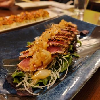 Tanoshi - a plate of food on a table - Sushi Bars Near Me - Chicago, Illinois