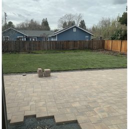 Pavers and sod being laid Pavers and sod being laid