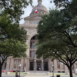 Exterior outside entrance of Texas Capitol City Tours - Close up of capitol - Austin, Texas Exterior outside entrance of Texas Capitol City Tours - Close up of capitol - Austin, Texas