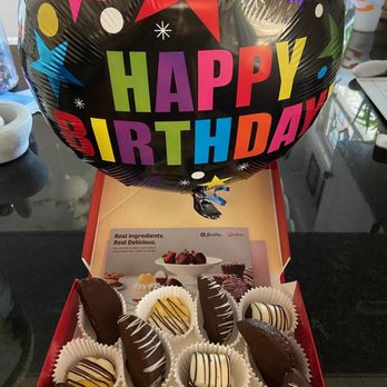 Edible Arrangements - a box of chocolates and a happy birthday balloon - Juice Bars & Smoothies Near Me - Nashville, Tennessee Edible Arrangements - a box of chocolates and a happy birthday balloon - Juice Bars & Smoothies Near Me - Nashville, Tennessee