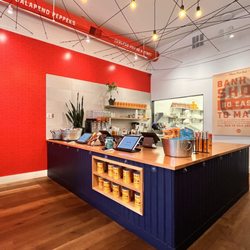 Bun Mee - The cashier/ordering station and kitchen in the back! Very clean space!