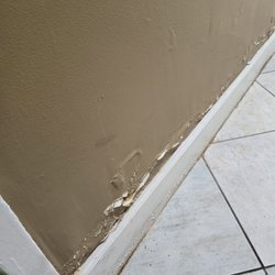 Zoomed-in photo of 1st floor lobby water damage