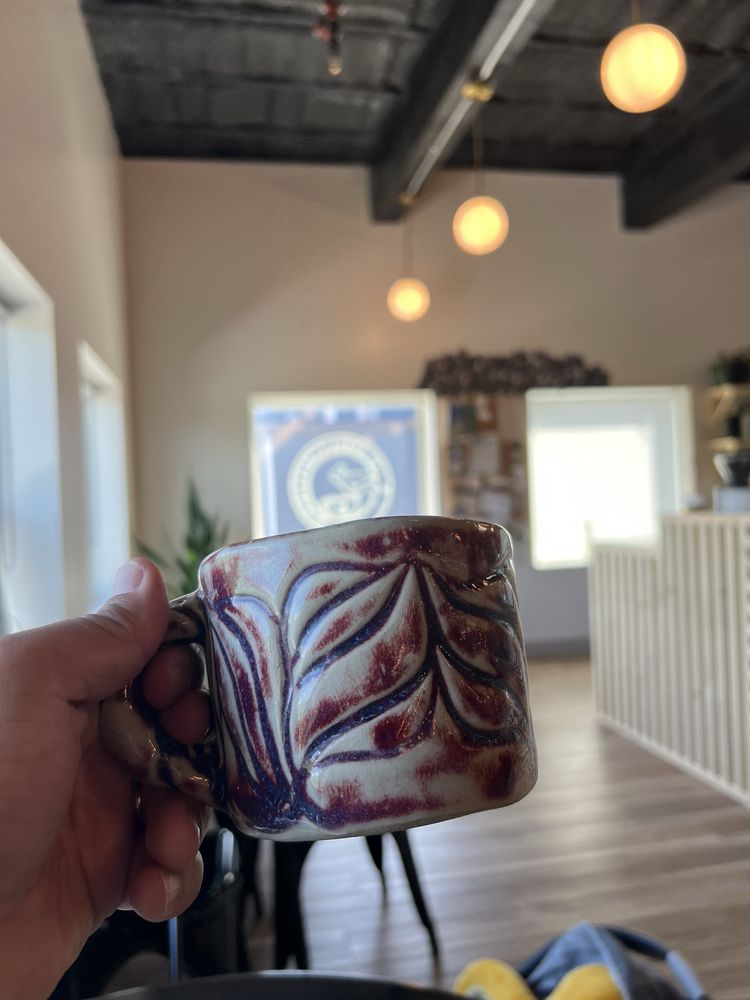 Alauda Coffeehouse Logo
