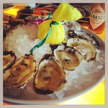 Captain George's Seafood Restaurant - 12 oysters on the half shell for $12 - Seafood Near Me - Kill Devil Hills, North Carolina