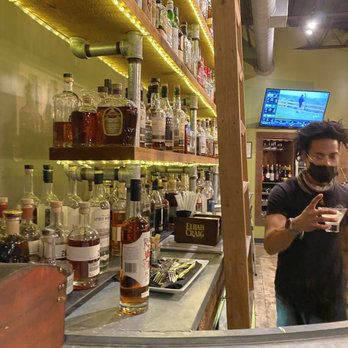 Sprig Restaurant - Sat at the bar to admire their HUGE bourbon collection. - Southern Near Me - Decatur, Georgia Sprig Restaurant - Sat at the bar to admire their HUGE bourbon collection. - Southern Near Me - Decatur, Georgia