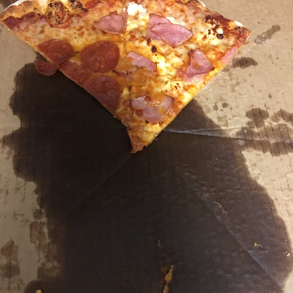 a slice of pizza in a box a slice of pizza in a box