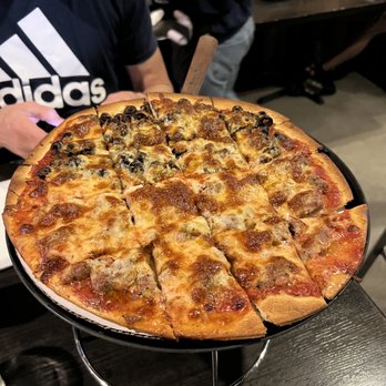 Danny's - Chicago - Sausage and Olive Thin Crust Pizza 12" - Pizza Near Me - Chicago, Illinois Danny's - Chicago - Sausage and Olive Thin Crust Pizza 12" - Pizza Near Me - Chicago, Illinois