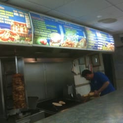 Harput Kebab & Burger - Counter and grill area