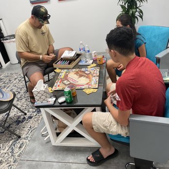 Tint Gods - Sitting area- thank goodness we just bought Monopoly to pass the hour by - Car Window Tinting Near Me - Rio Rancho, New Mexico