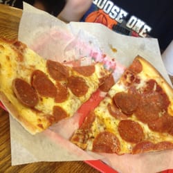 Two pieces of pizza & a pop only $3!