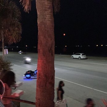 The Spot - Blood red moon from patio - Burgers Near Me - Galveston, Texas The Spot - Blood red moon from patio - Burgers Near Me - Galveston, Texas