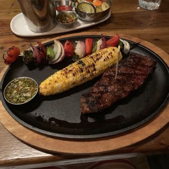 Fuego By Mana - "NewYork strip" with roasted corn and grilled vegetables - Kosher Near Me - North Miami Beach, Florida Fuego By Mana - "NewYork strip" with roasted corn and grilled vegetables - Kosher Near Me - North Miami Beach, Florida