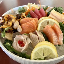 Shiki Japanese Restaurant - Dinner Sashimi combo. Calamari salad, 5 thin snapper w/roe, 4 salmon, 3 tuna, two white tuna, & 2 albacore tuna.  W/rice & soup.