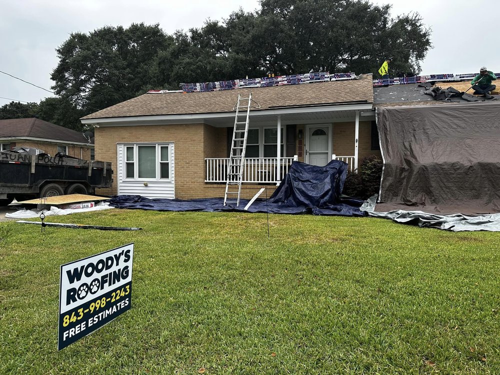 Slide of Woody's Roofing