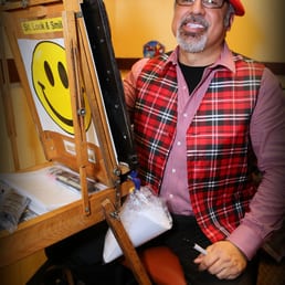 The cartoonist, Rene, was focused yet cheerful the entire time.  All the guests were happy with their cartoon.