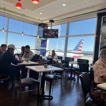 Phillips Seafood - people sitting at tables in a restaurant - Seafood Near Me - Atlanta, Georgia