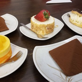 Tiny Pyramid - Mango peach + Chocolate Pyramids (one original and one with raspberry) + Strawberry Shortcake + Eclair - Cafes Near Me - Honolulu, Hawaii Tiny Pyramid - Mango peach + Chocolate Pyramids (one original and one with raspberry) + Strawberry Shortcake + Eclair - Cafes Near Me - Honolulu, Hawaii