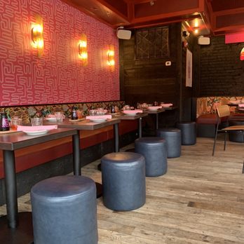And Dim Sum - tables and stools in a restaurant - Dim Sum Near Me - Richmond, Virginia