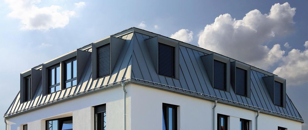 Slide of KTM Roofing