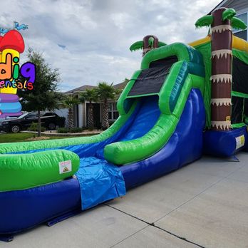 Shindig Inflatable Rentals - Side view of the tiki bounce house waterslide combo - Bounce House Rentals Near Me - Coolidge, Georgia