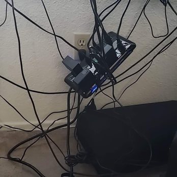 Spectrum - I have an area that this was sitting on but he just left it dangling mid air pulling on all my cords and cables - Internet Service Providers Near Me - Lancaster, California
