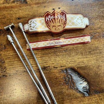 Isla del Sol cigar and picks for fruit.