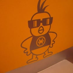 Unidentified Flying Chickens - Chicken on wall