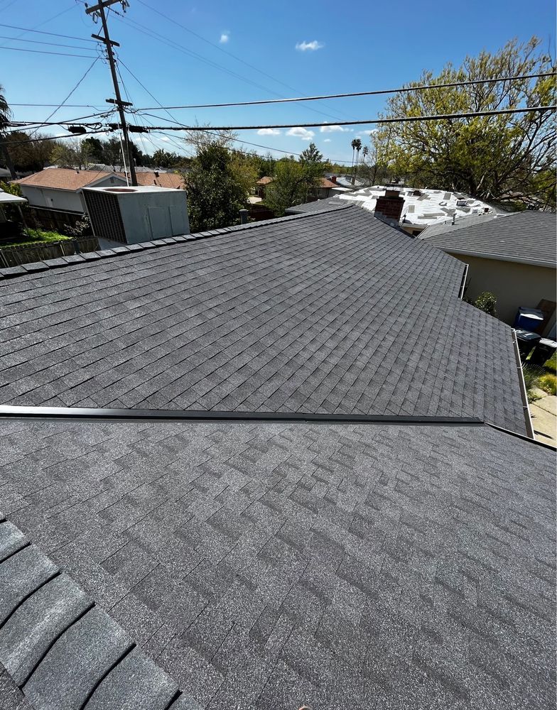 Slide of Los Reyes Roofing